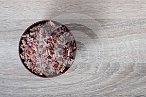 Top view stream brown rice in bowl