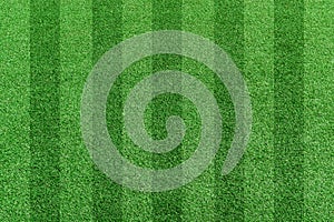 Top view stripe grass soccer field.