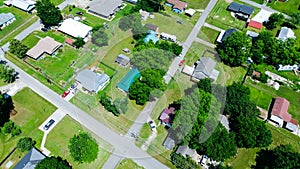 Top view suburban homes with large backyard, storage sheds in Checotah, McIntosh County, Oklahoma, medium income residential photo