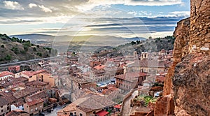 Sunset over Daroca antique village with tile roofs