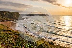 Top view of the sunset over Los Locos beach. Suances, Cantabria, Spain photo