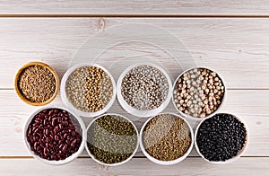 Top view superfood assortment in a various bowls