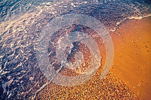 Top view of the surf line on the beach