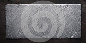 Top view of sushi black slate. Asian cuisine background banner design. Empty stone textured food plate from above
