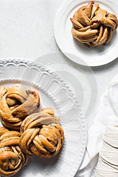 top view of Swedish cinnamon buns on a white plate