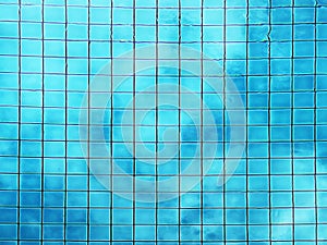 Top view of swimming pool bottom caustics ripple and flow with waves background. Summer background. Texture of water surface