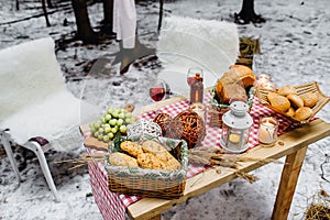 Top view of a table with dread and cookies baskets