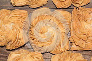 top view of table with fried sweet potato and quince cakes