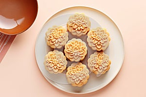 Top view of taditional Chinese Mooncake pastries on plate