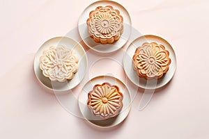 Top view of taditional Chinese Mooncake pastries on plate