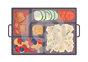 Top view of takeaway lunchbox for school, healthy breakfast with snacks prepared for child