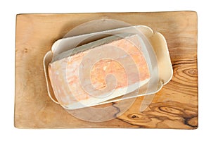 Top view of Taleggio cheese on board isolated