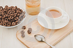 Top view of tea, honey and flakes/top view of tea, honey and flakes on a wooden background