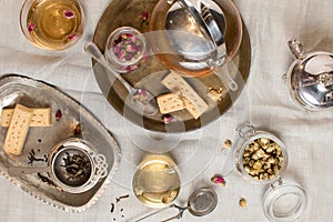 Top view of tea set and biscuits