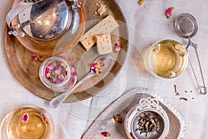 Top view of tea set and biscuits