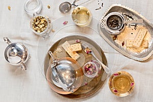 Top view of tea set and biscuits