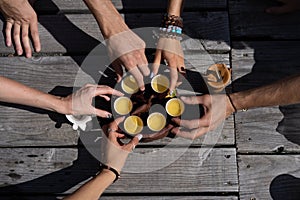 Top view tea set a wooden table for tea ceremony background. Woman and man holding a cup of tea