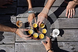 Top view tea set a wooden table for tea ceremony background. Woman and man holding a cup of tea