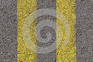 Top View Texture Asphalt With Two Yellow Lines Across