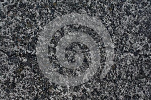 Top view of textured background wallpaper of grain grey asphalt