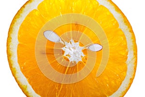 Top view of textured ripe slice of orange citrus fruit isolated looks like acat head with her pips on white background.