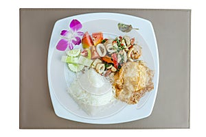 Top view of Thai traditional dish Pad Kra Pao, stir fried seaf