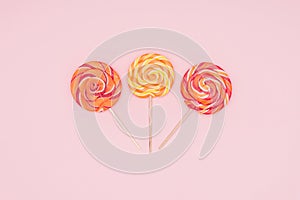 top view of three round yummy lollipops