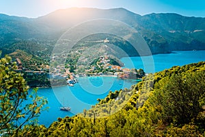 Top view to Assos village Kefalonia. Greece. Beautiful turquoise colored bay lagoon water surrounded by pine and cypress