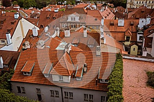 Top view to red roofs skyline of Prague city, Czech Republic. Aerial view