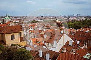 Top view to red roofs skyline of Prague city, Czech Republic. Aerial view of city with terracotta roof tiles, Prague, Czechia