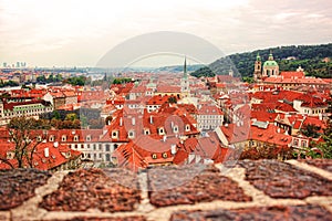 Top view to red tile roofs of Prague city Czech republic. Typical Prague houses