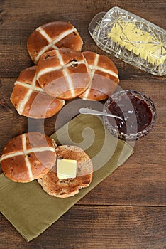 Top view toasted hot cross bun with butter