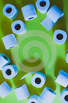 Top view of toilet paper rolls frame on the green