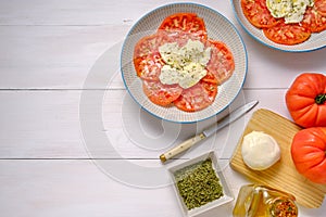 Top view of a tomato and mozzarella salad.