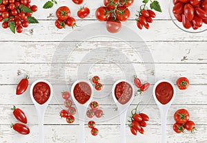 top view tomato sauce spoon with tomatoes isolated on kitchen white wooden table banner copy space template