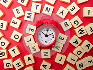 Top view Toys word and alarm clock photo