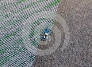 Top view of the tractor that plows the field. disking the soil. Soil cultivation after harvest