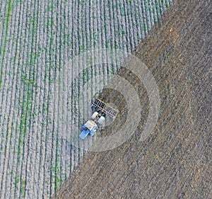 Top view of the tractor that plows the field. disking the soil.