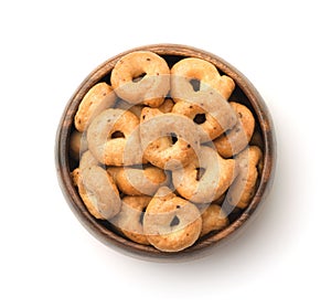 Top view of traditional italian taralli in wooden bowl photo
