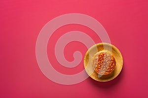 Top view traditional style Chinese mooncake on red