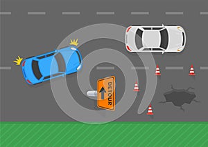 Top view of a traffic flow and detour sign on the roadway. Safe driving tips and traffic regulation rules.