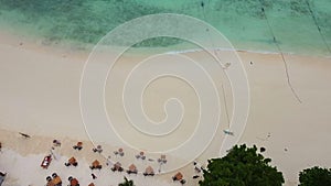 Top View of Tropical Hotel Resort on Beach with Restaurant, Sunbaths and Sea