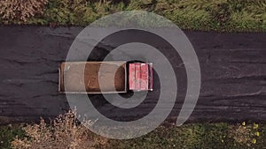 Top View of Truck Riding and Tugging in a Dirty Road