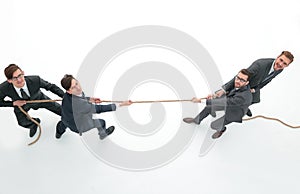 Top view.a tug of war between business teams