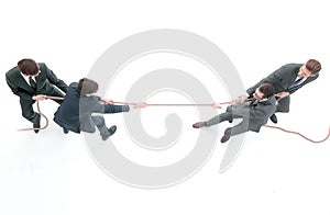 Top view.a tug of war between business teams