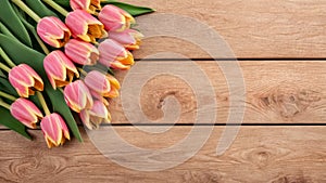 top view of tulips on wooden table