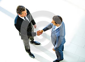 Top view of a two businessman shaking hands