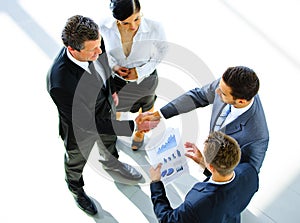 Top view of a two businessman shaking hands