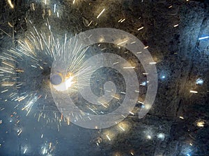 A top view of a type of firework cracker known as Chakra or Chakri rotating on the ground, during the Diwali festival celebrations