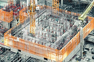 Top view of an under construction building. Civil engineering, industrial development project, tower basement infrastructure photo